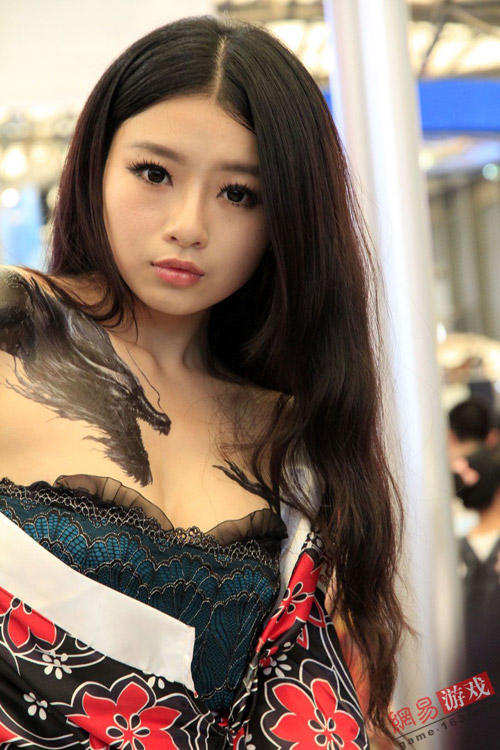 ChinaJoy 2011: Xem mỹ nữ cởi áo khoe hình xăm - Ảnh 9